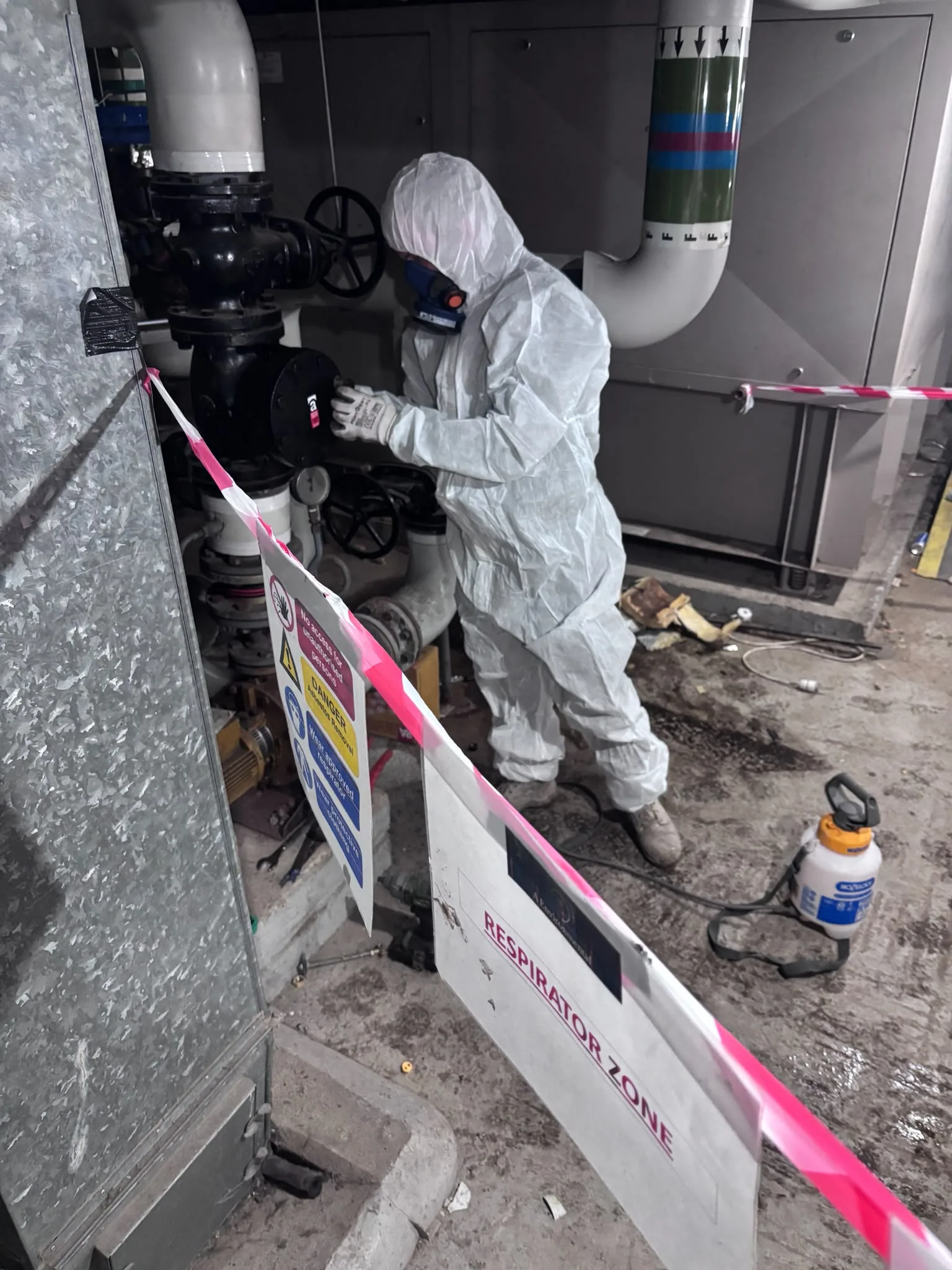 Asbestos artex removal from concrete soffit in Stratford